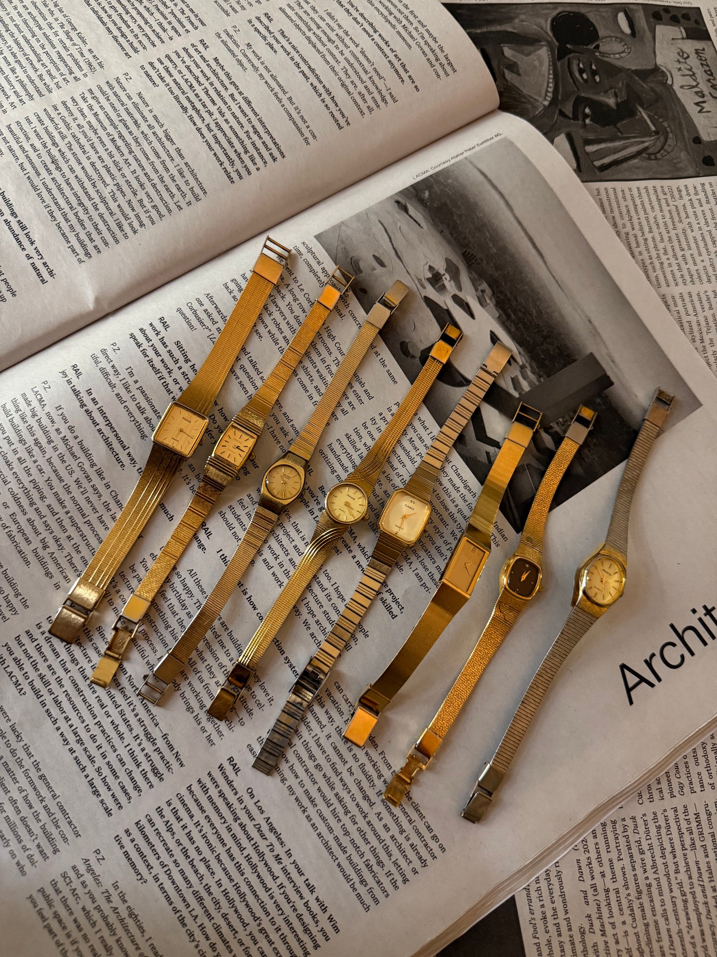 Gold black face hearts detail band watch