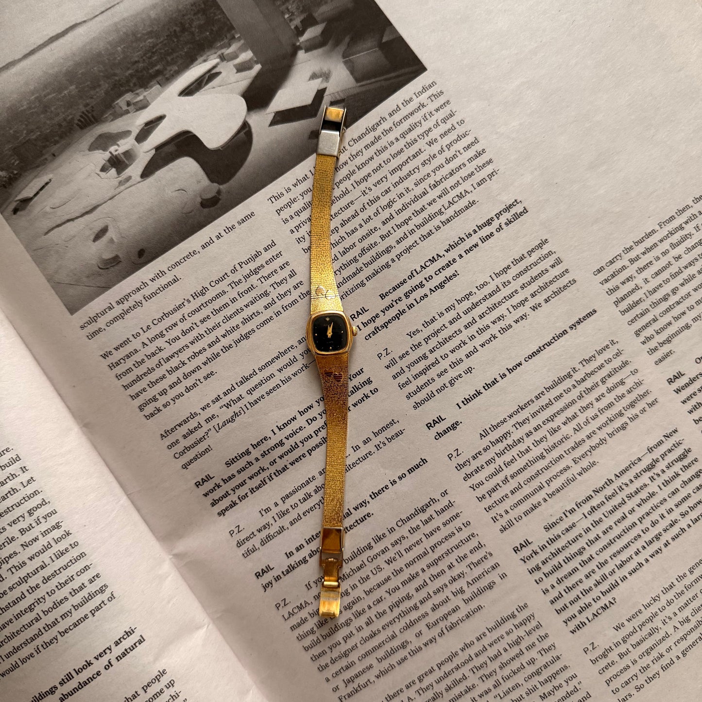 Gold black face hearts detail band watch