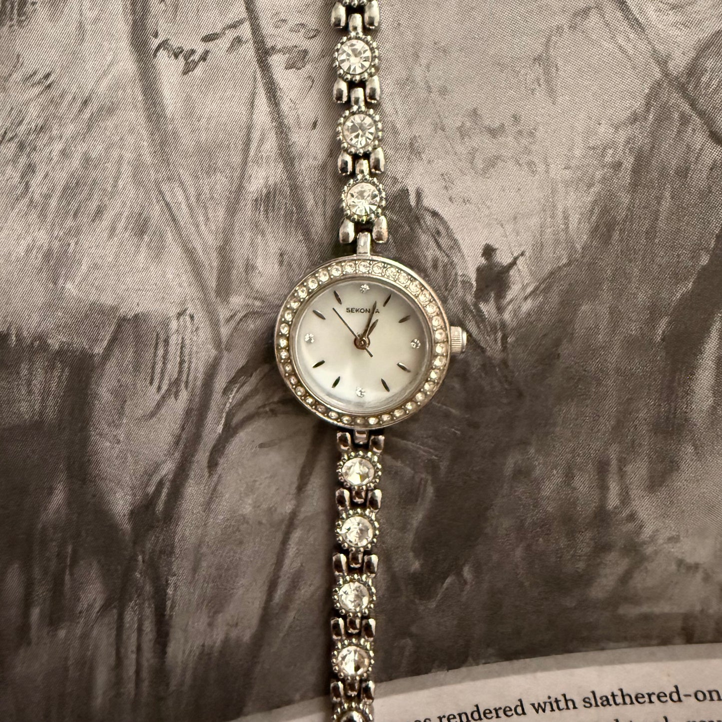 Silver slim circle embellished watch