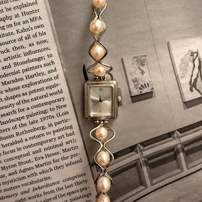 Silver square pearl band watch