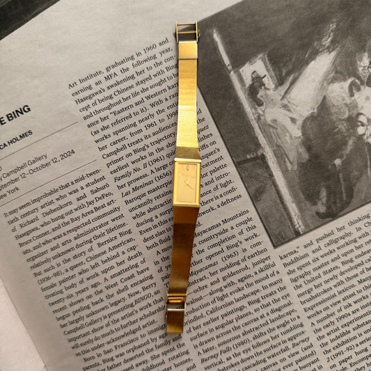 Gold rectangle face smooth minimal watch